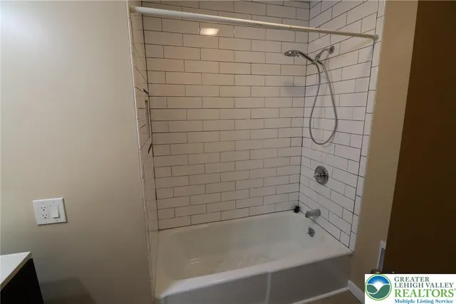 a bathroom with a bathtub