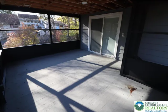 a view of balcony with furniture