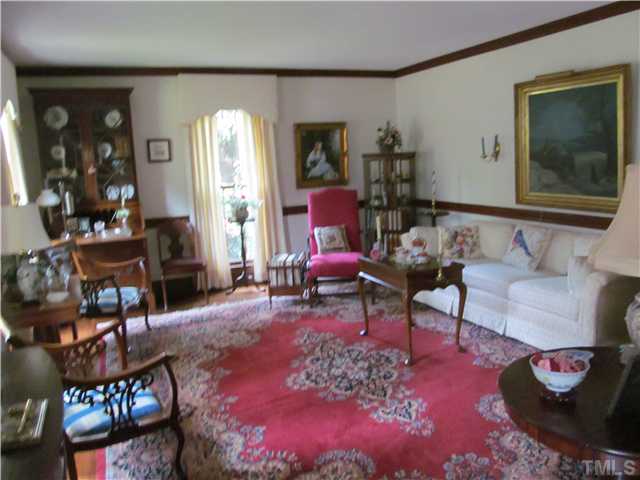 7420 Grist Mill Road Raleigh, NC 27615 - Photo 6 of 12 a living room with furniture and wooden floor