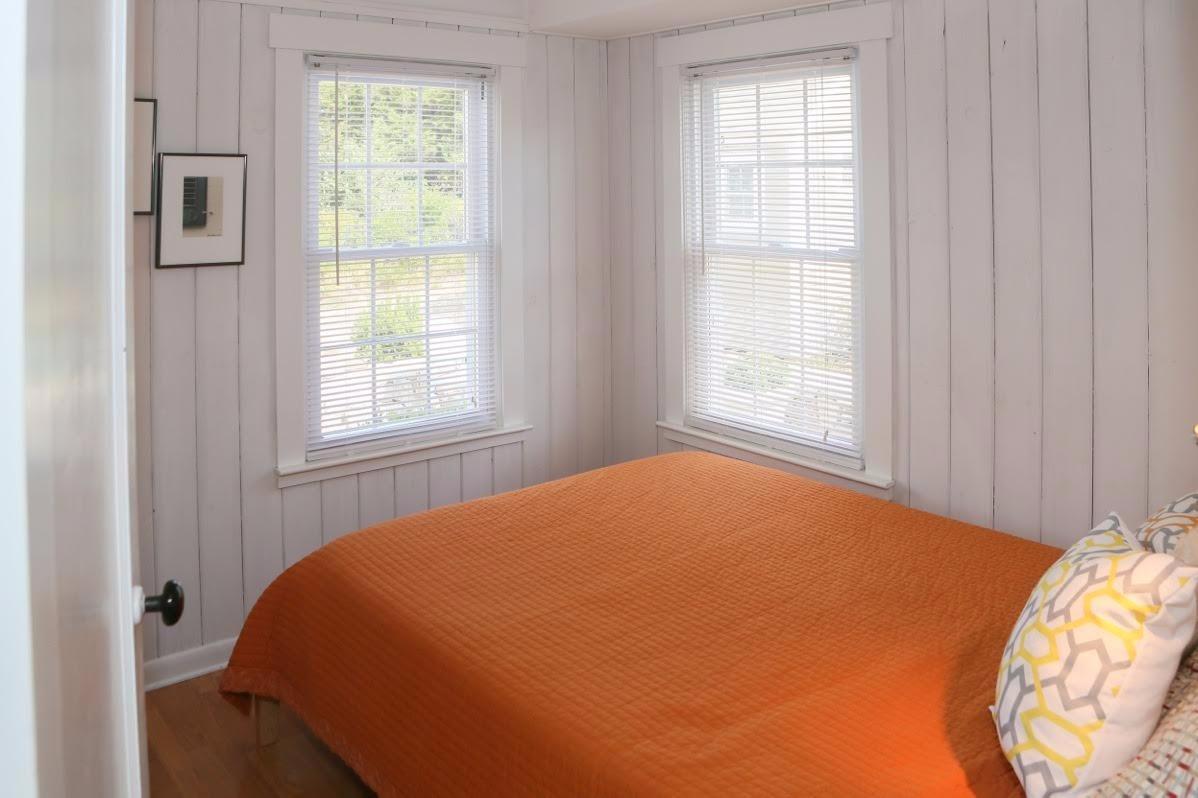 80 Bayview Road Eastham, MA 02642 - Photo 15 of 35 a bedroom with a bed and a window