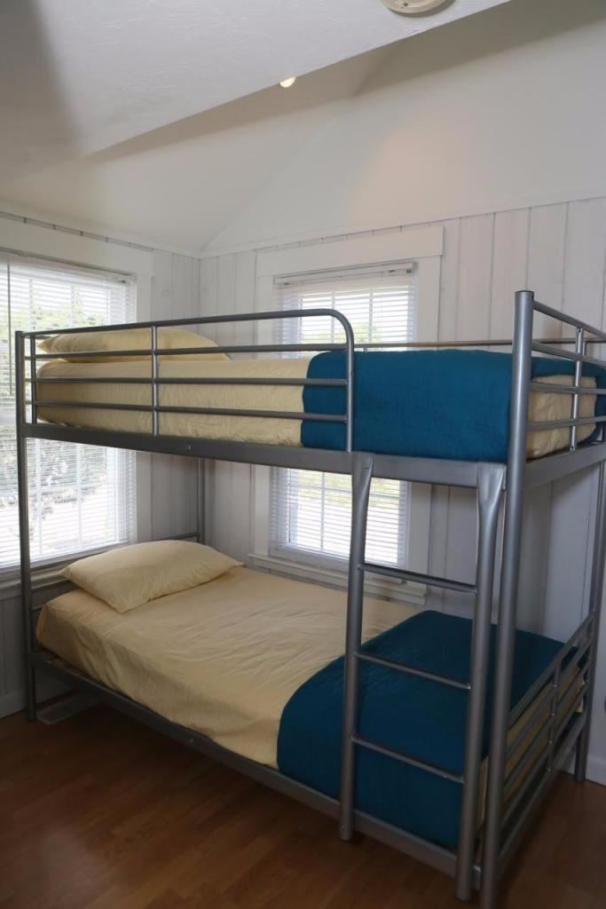 80 Bayview Road Eastham, MA 02642 - Photo 21 of 35 a bedroom with a bed and a window