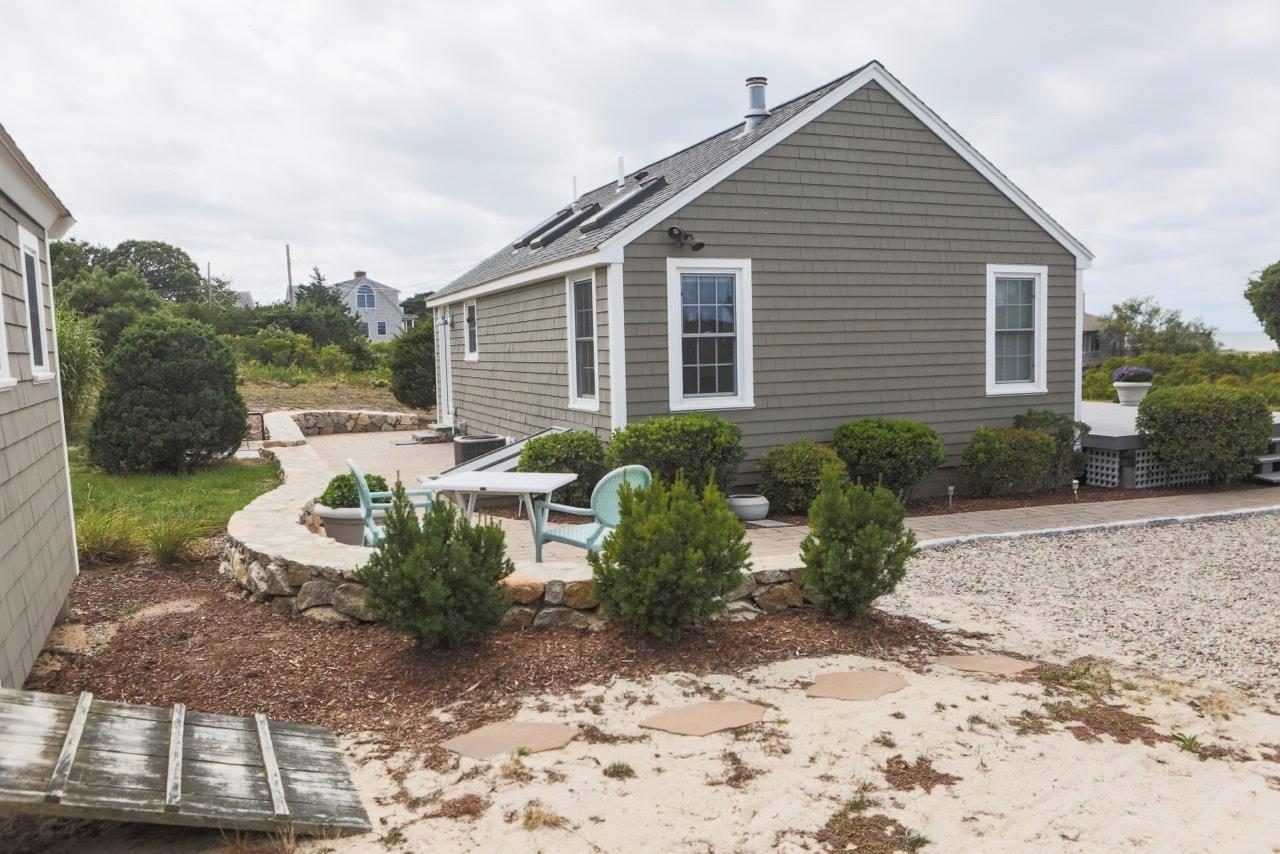 80 Bayview Road Eastham, MA 02642 - Photo 25 of 35 a front view of a house with garden