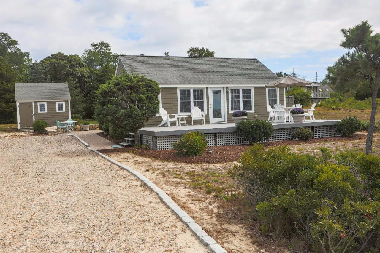 80 Bayview Road Eastham, MA 02642 - Photo 27 of 35 front view of house with a yard