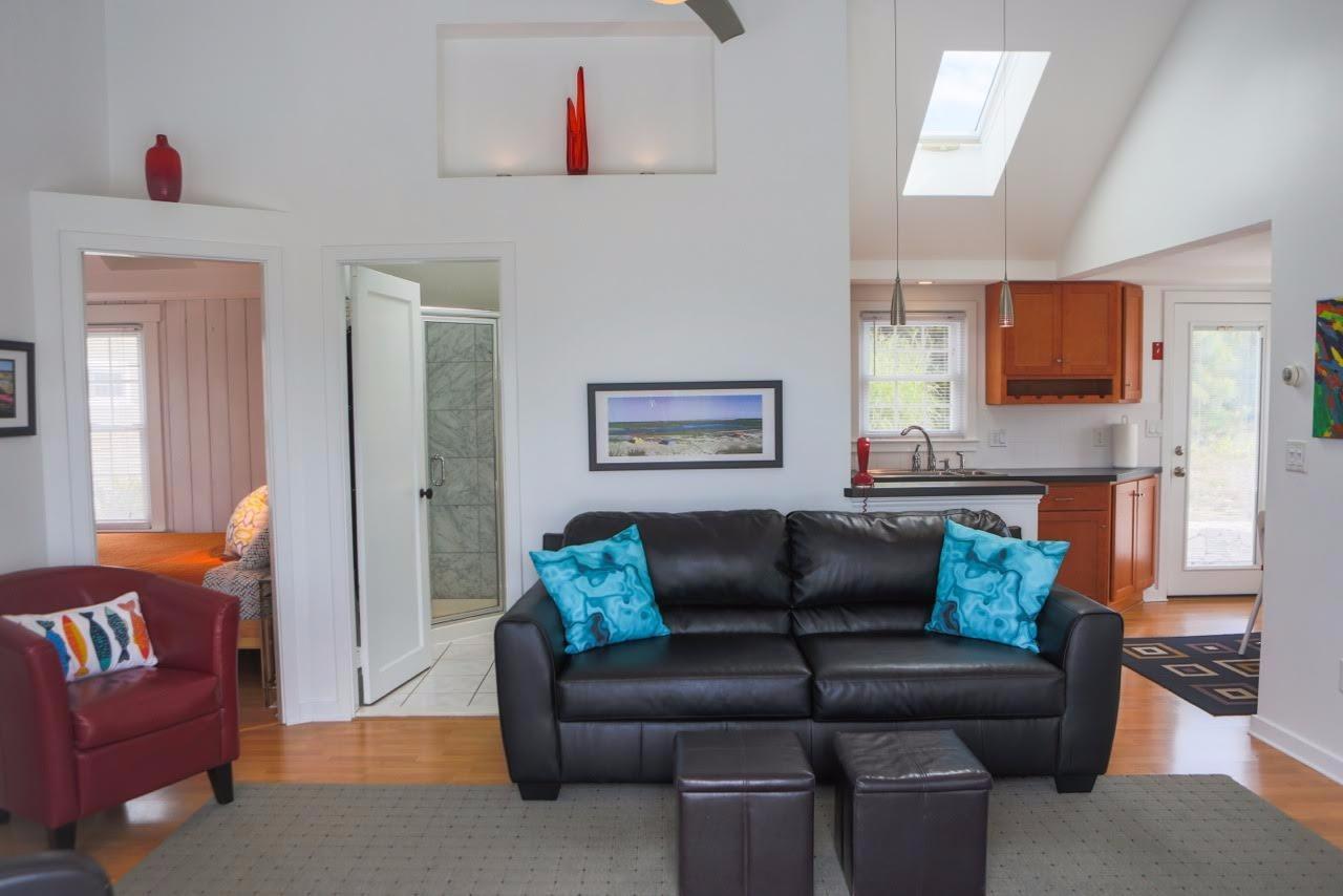 80 Bayview Road Eastham, MA 02642 - Photo 7 of 35 a living room with furniture and a couch