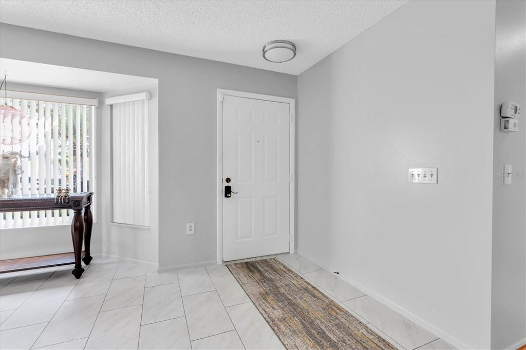 7099 Pond View Court Spring Hill, FL 34606 - Photo 7 of 64 a view of an empty room