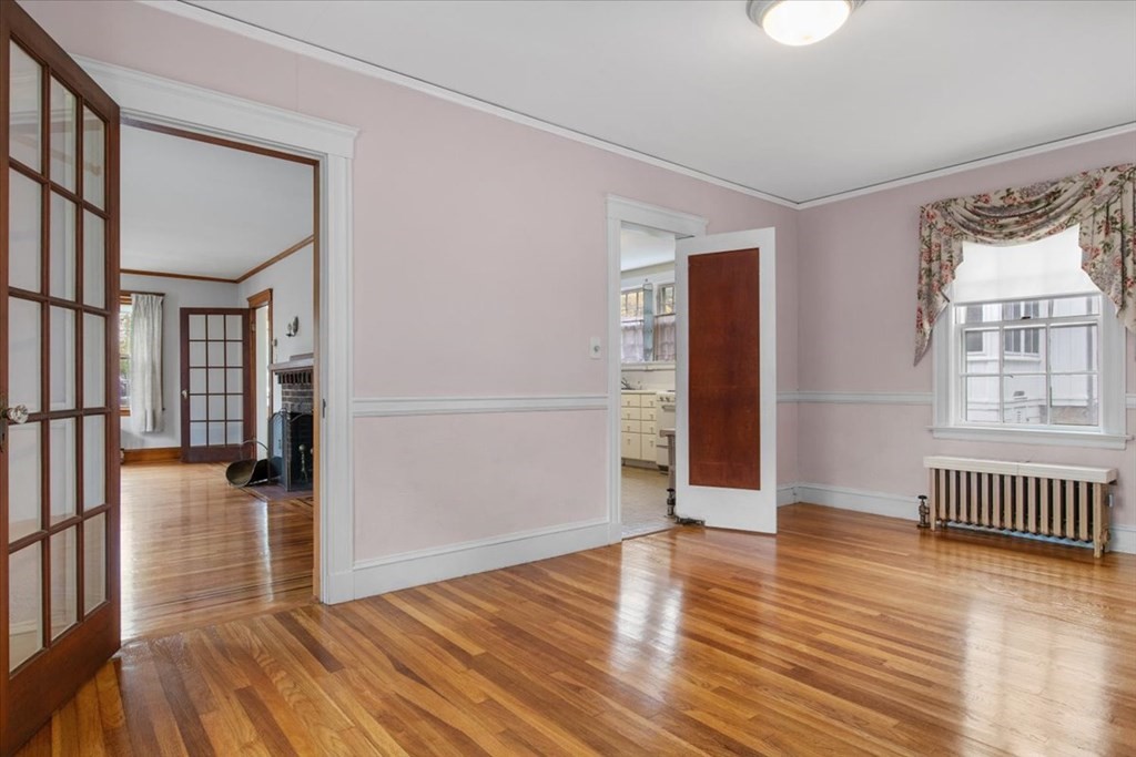 41 Bogandale Road Boston, MA 02132 - Photo 13 of 38 wooden floor in an empty room with a window