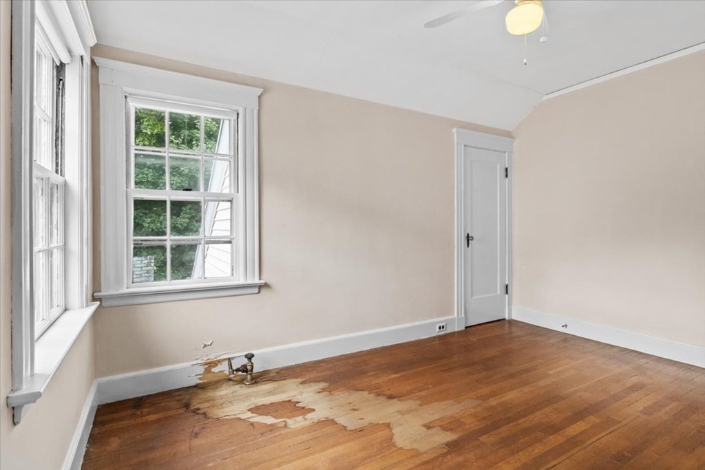 41 Bogandale Road Boston, MA 02132 - Photo 23 of 38 wooden floor in an empty room with a window
