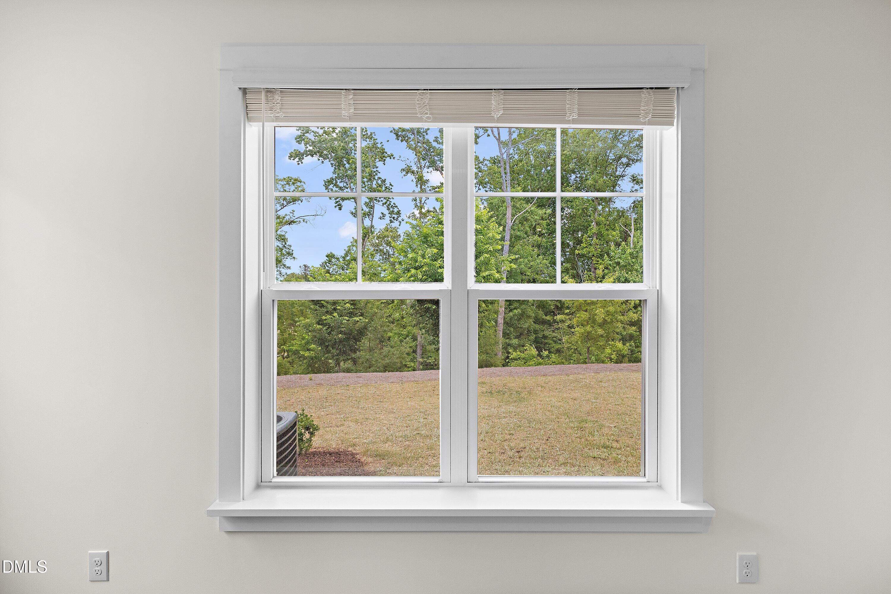 156 Sears Ridge Lane Morrisville, NC 27560 - Photo 35 of 49 a view of a room that has a window