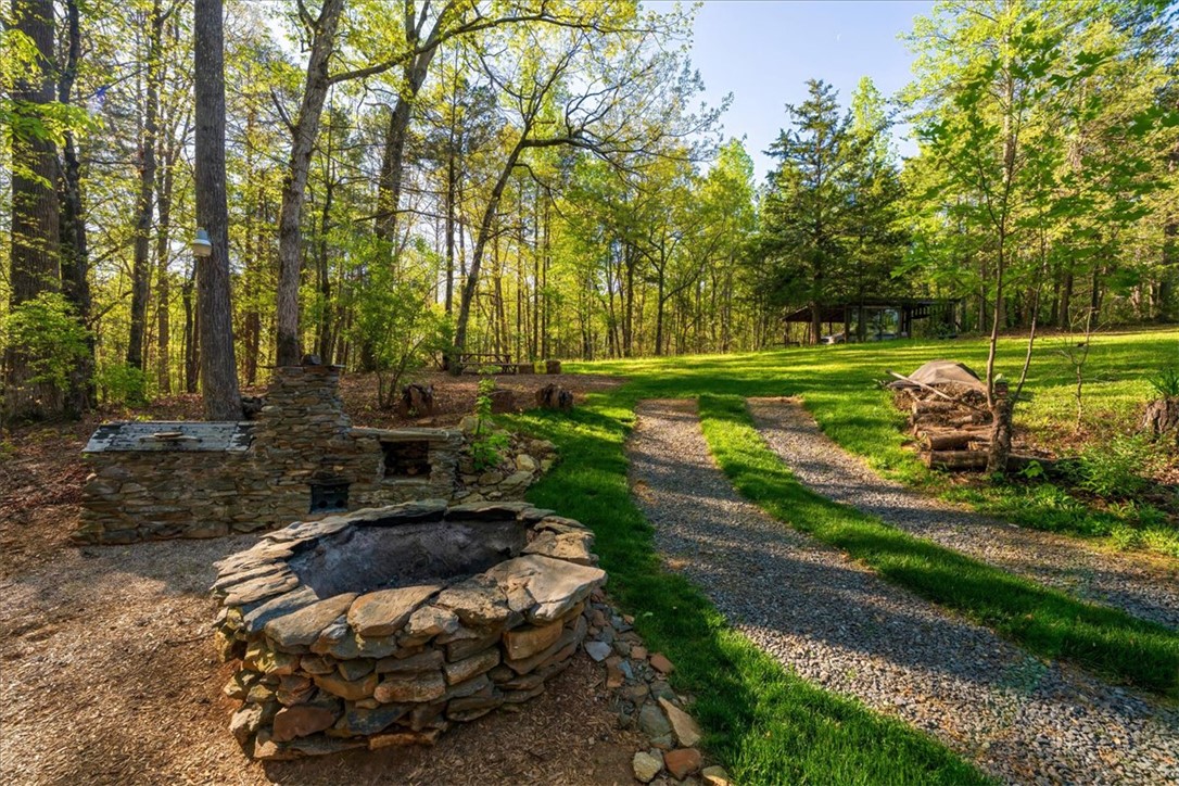 930 Nimmons Bridge Road Salem, SC 29676 - Photo 1 of 19 This verdant retreat offers a private yard with a charming outdoor kitchen and fire pit.