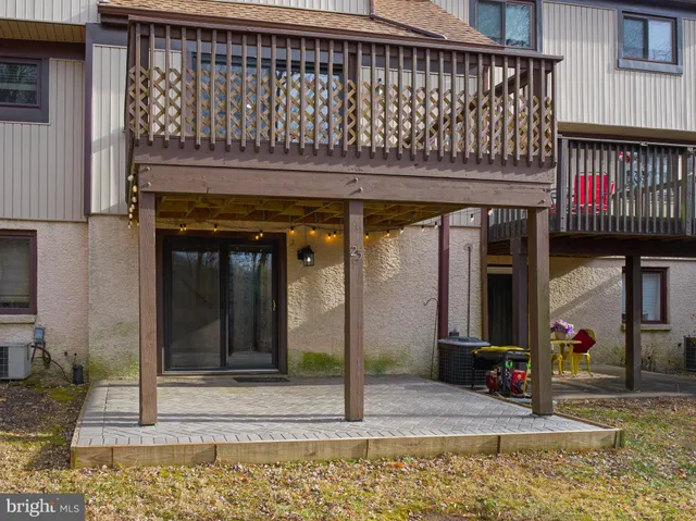 a front view of a building with retail shops