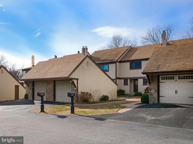 a view of street with parked cars