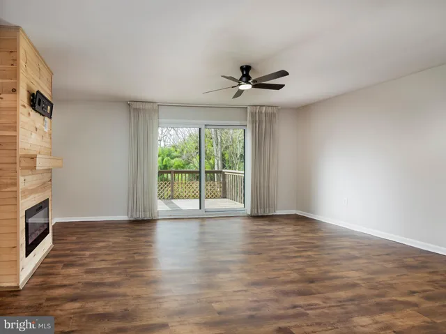 a view of room window and wooden floor