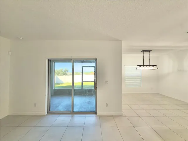 an empty room with a natural light