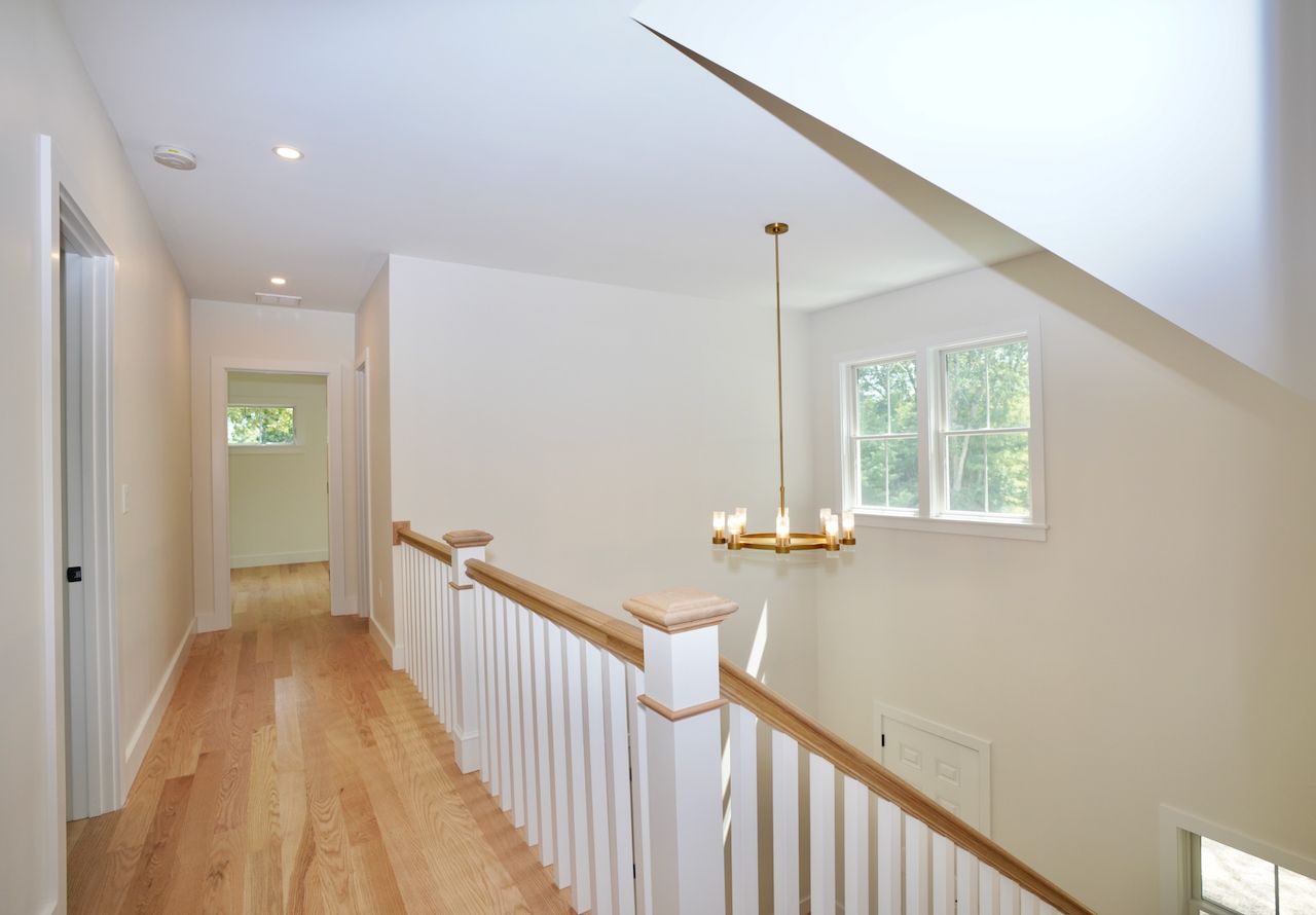 5 Ogden Lane Edgartown, MA 02539 - Photo 14 of 22 a view of a hallway with windows