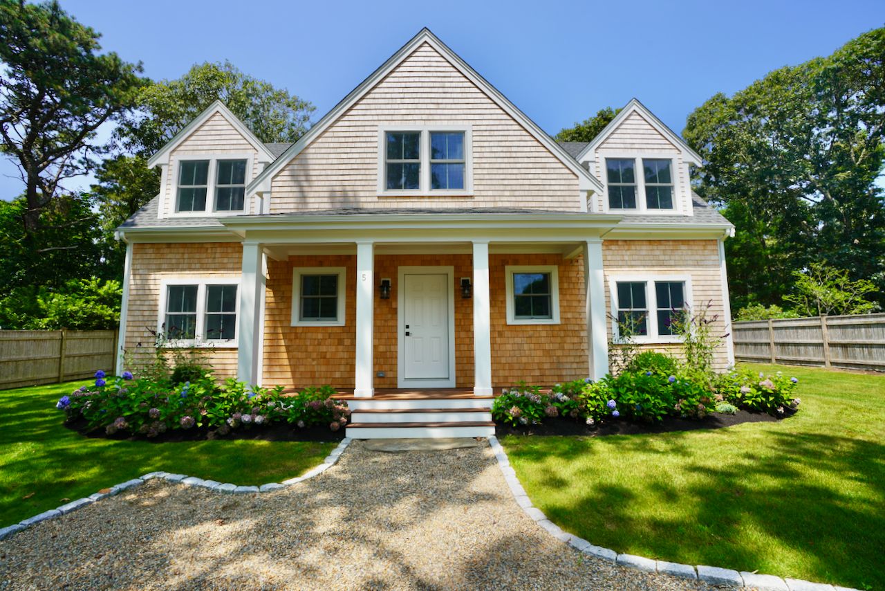 5 Ogden Lane Edgartown, MA 02539 - Photo 2 of 22 a front view of a house with a yard