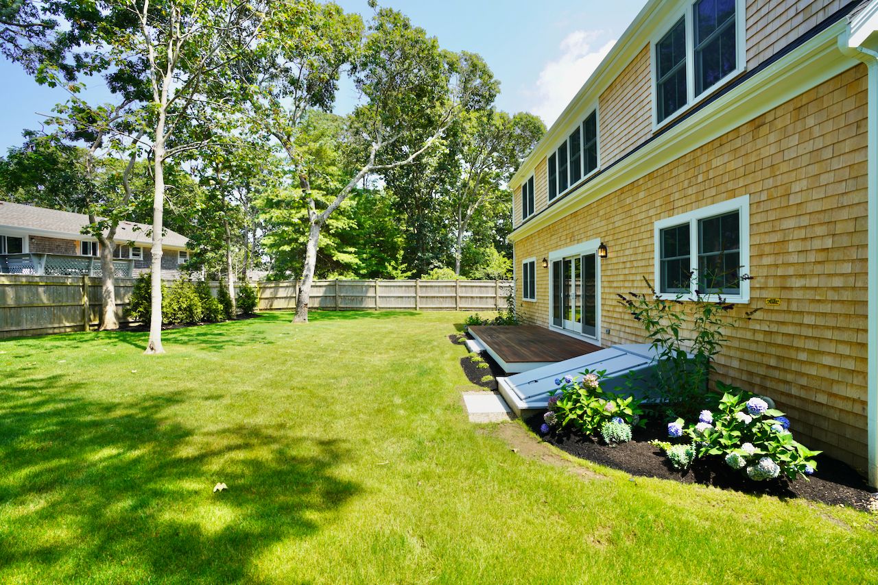 5 Ogden Lane Edgartown, MA 02539 - Photo 21 of 22 a view of a house with a backyard