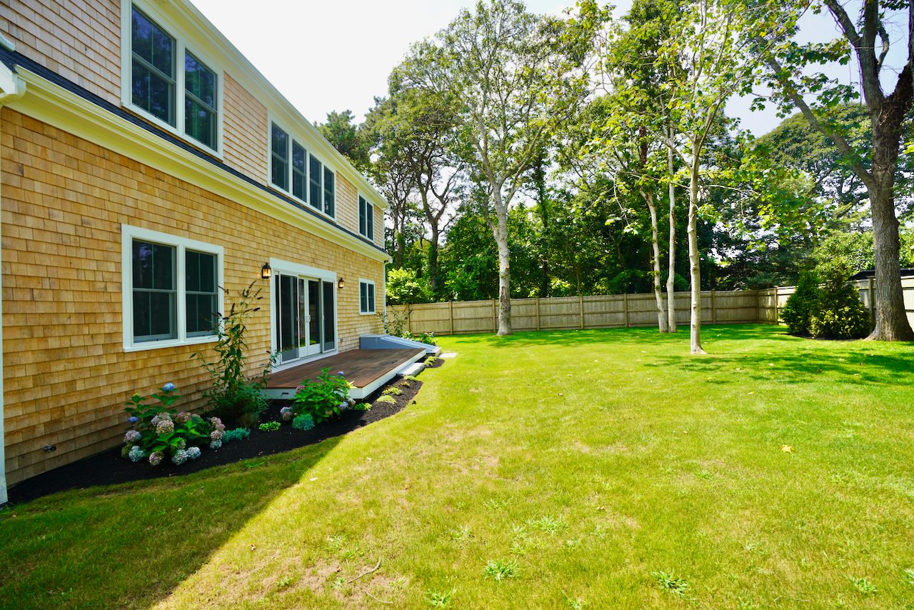 5 Ogden Lane Edgartown, MA 02539 - Photo 22 of 22 a view of a house with a backyard