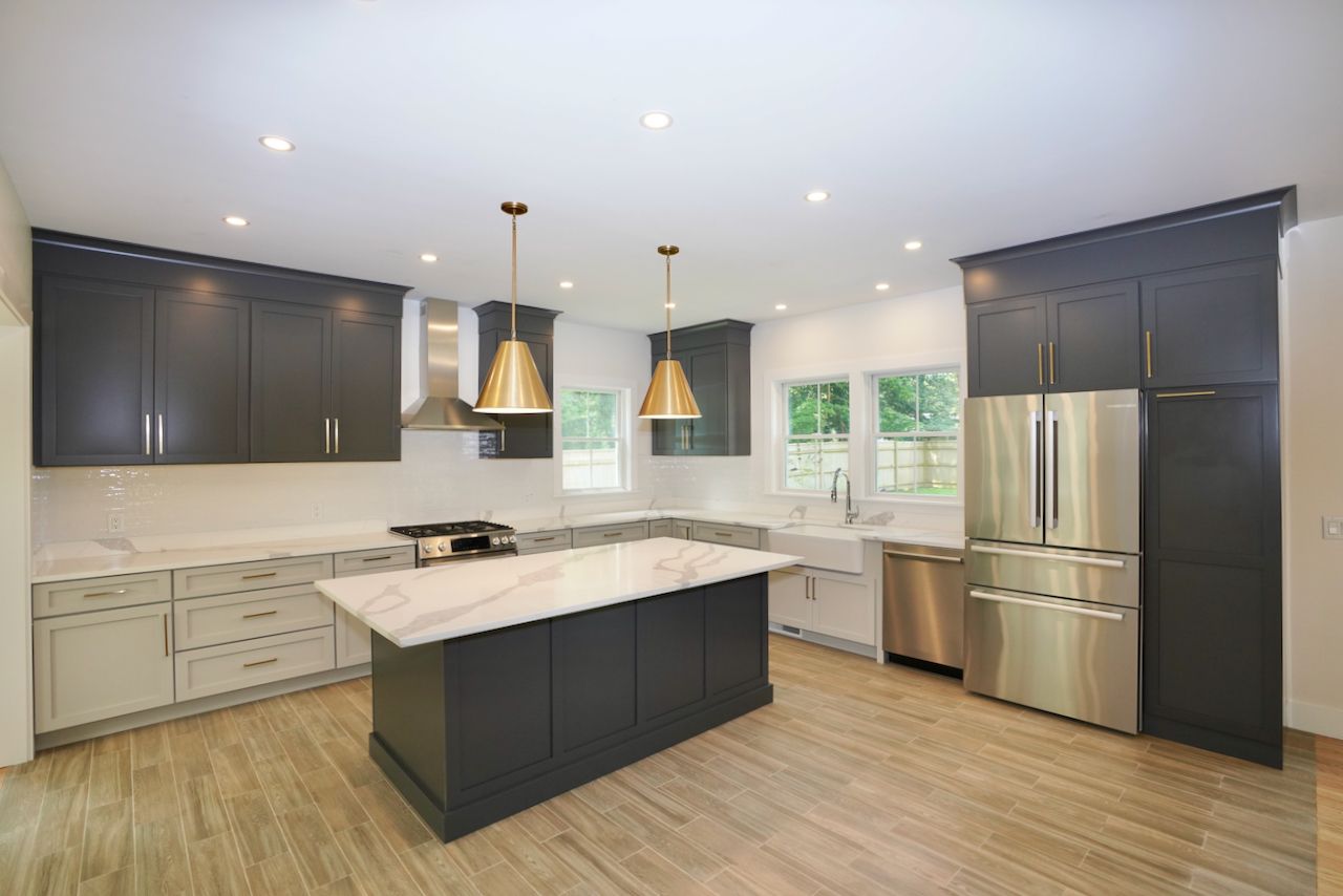 5 Ogden Lane Edgartown, MA 02539 - Photo 5 of 22 a kitchen with a sink appliances and cabinets