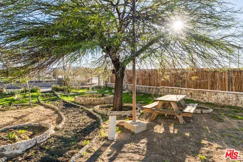 a kitchen with a sink stove and refrigerator