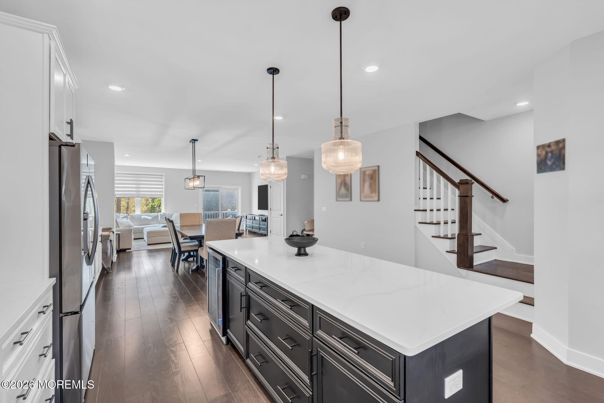 12 Raritan Boulevard Keyport, NJ 07735 - Photo 13 of 41 a kitchen with stainless steel appliances a stove a sink a center island and chairs