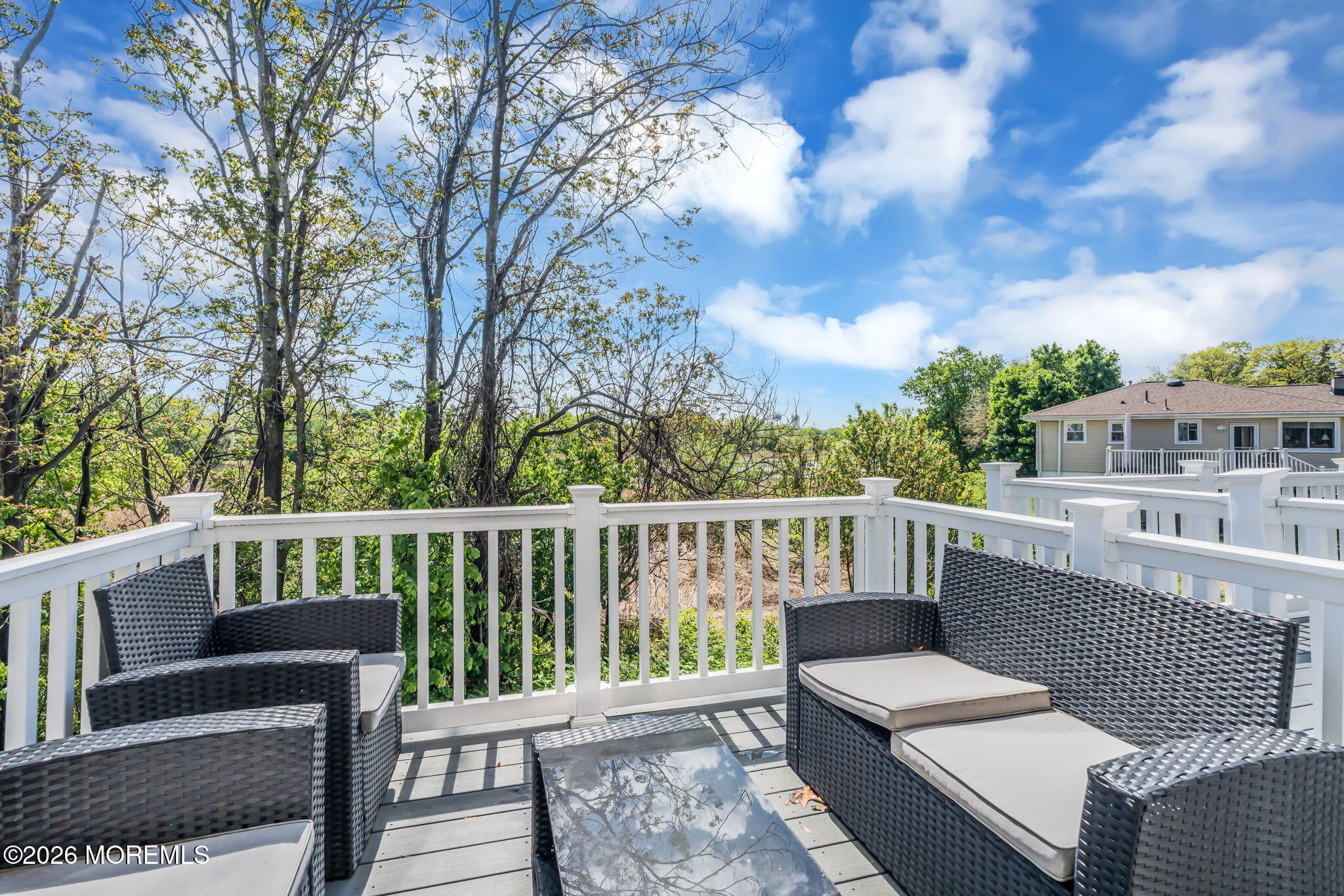 12 Raritan Boulevard Keyport, NJ 07735 - Photo 17 of 41 a view of a balcony with wooden floor and outdoor seating