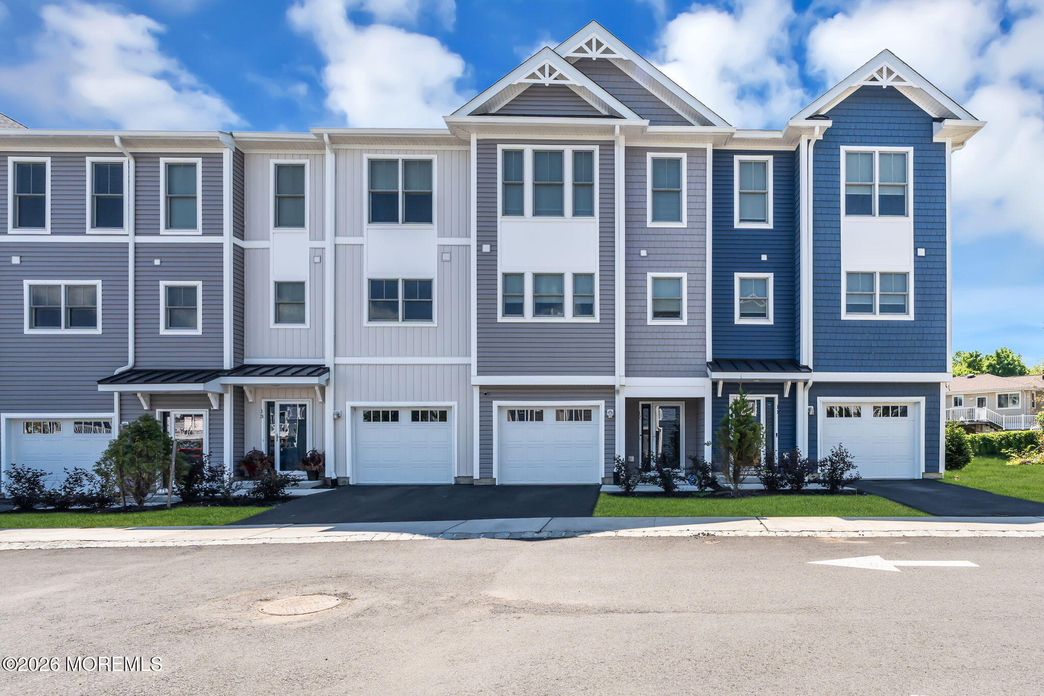 12 Raritan Boulevard Keyport, NJ 07735 - Photo 2 of 41 a front view of a residential apartment building with a yard
