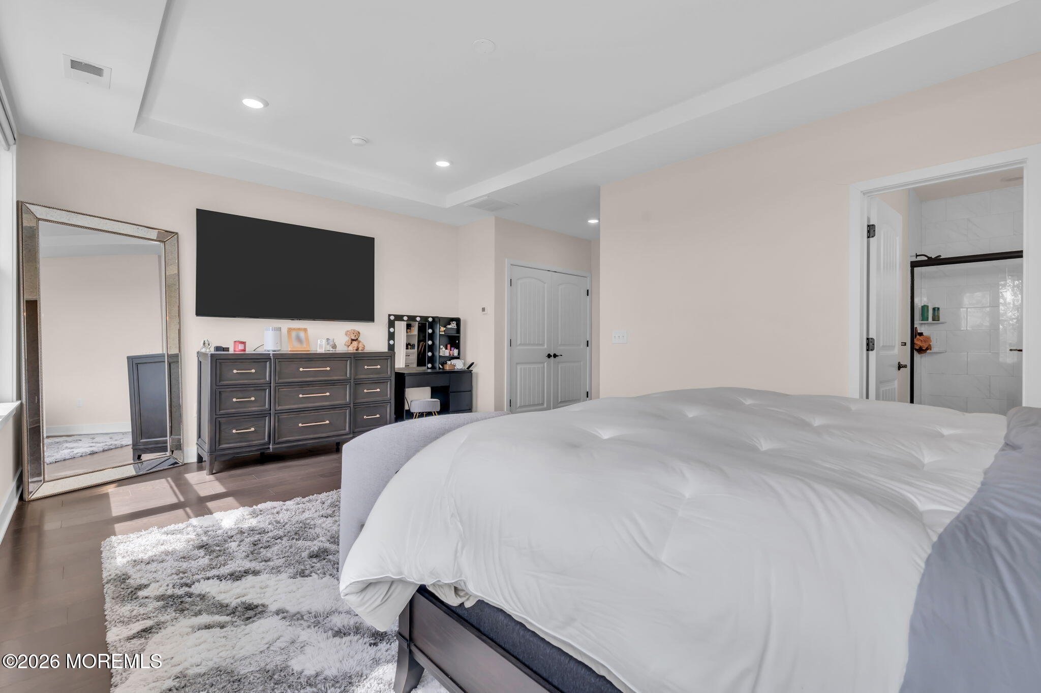 12 Raritan Boulevard Keyport, NJ 07735 - Photo 23 of 41 a spacious bedroom with a bed and a flat screen tv