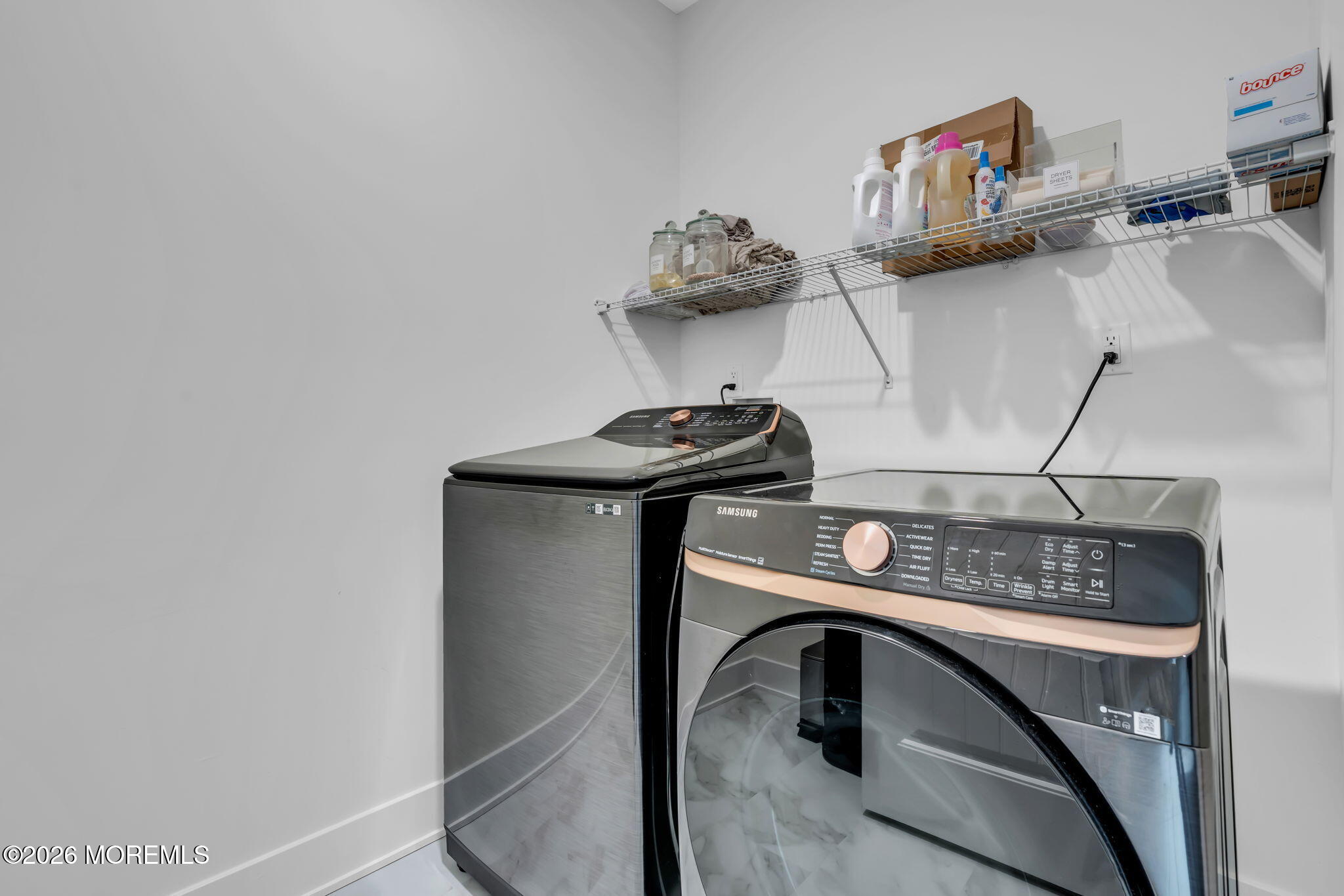 12 Raritan Boulevard Keyport, NJ 07735 - Photo 27 of 41 a utility room with dryer and washer