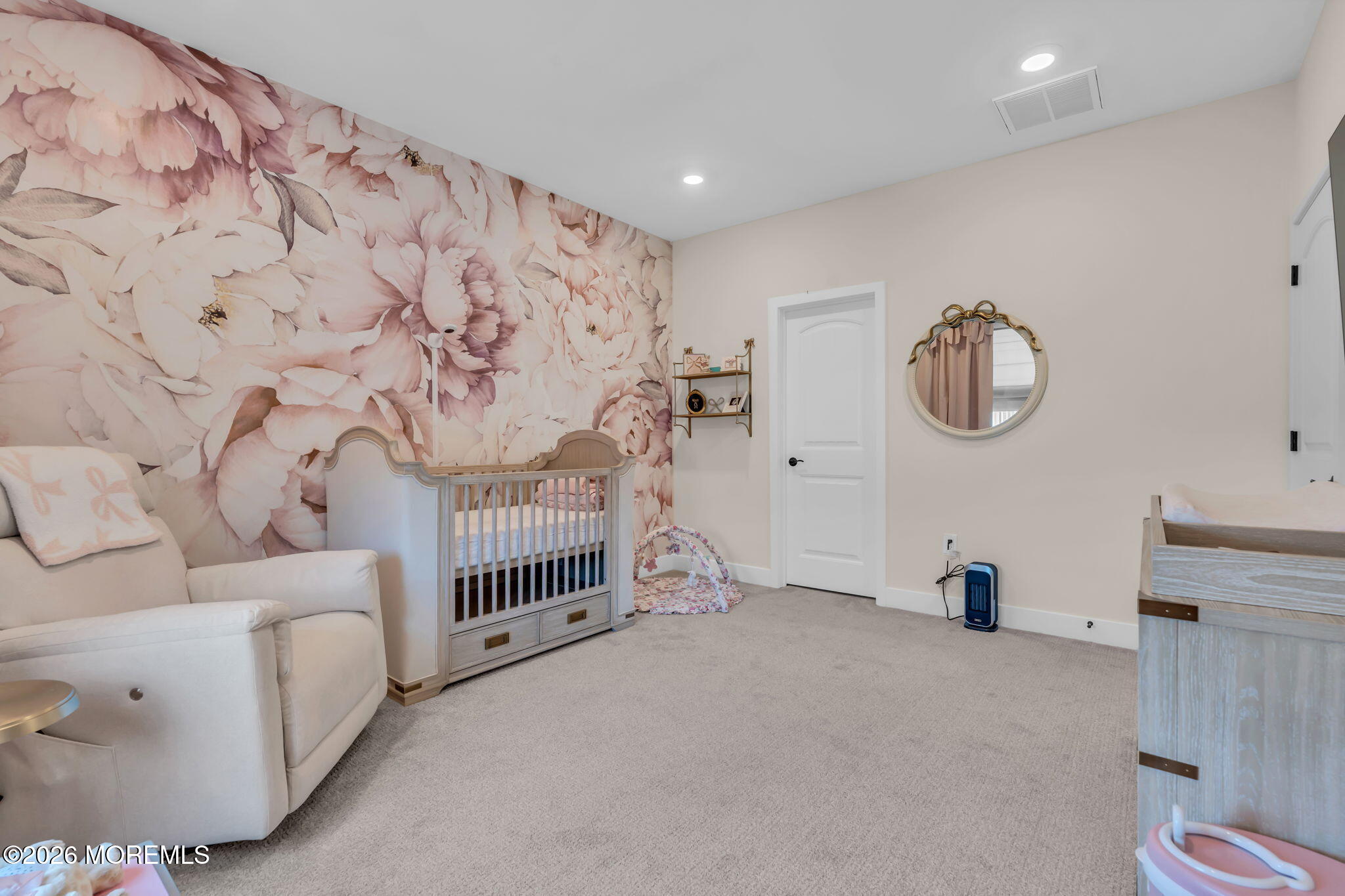 12 Raritan Boulevard Keyport, NJ 07735 - Photo 29 of 41 a spacious bedroom with a bed and a couch