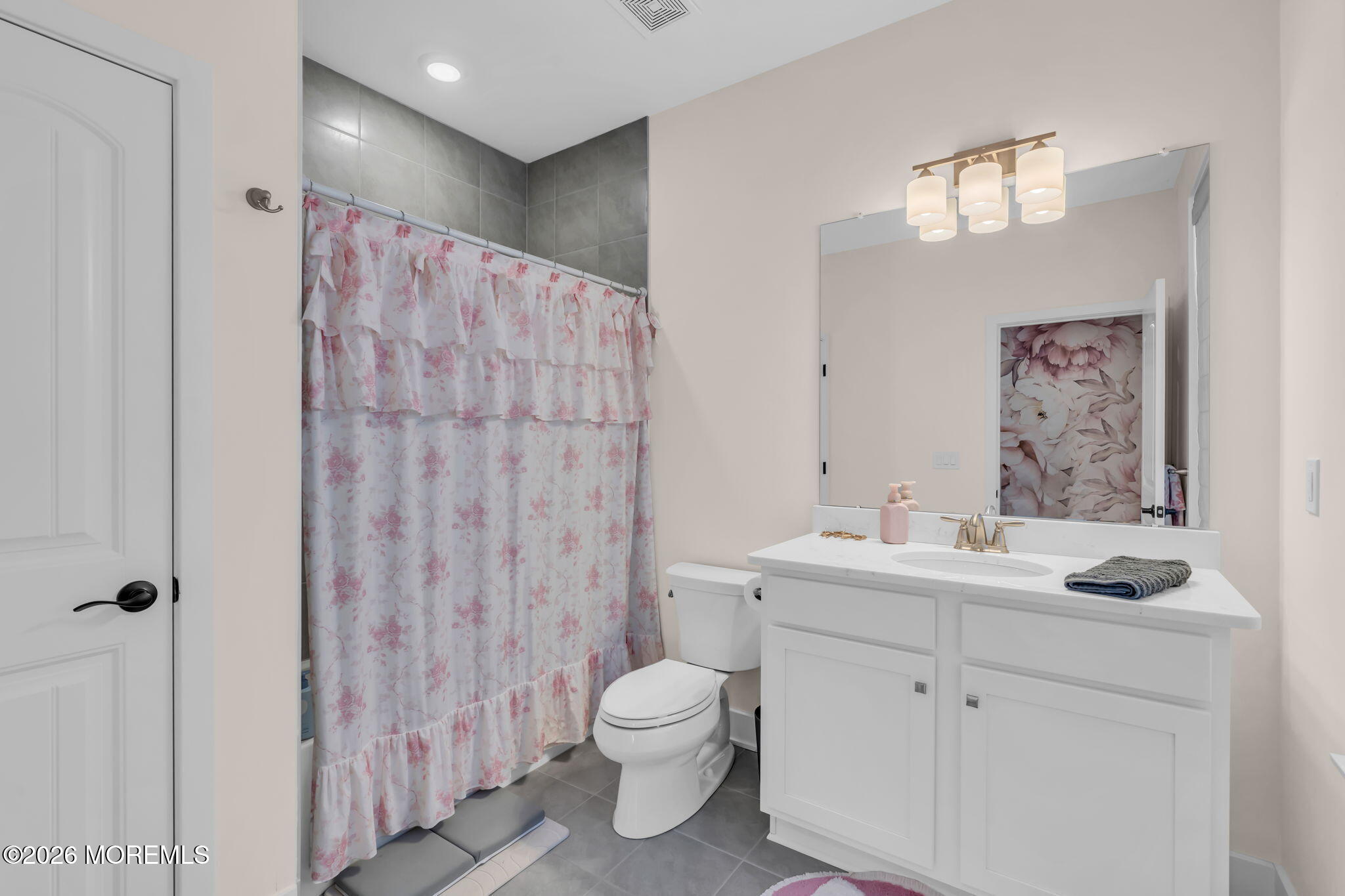 12 Raritan Boulevard Keyport, NJ 07735 - Photo 30 of 41 a bathroom with a toilet sink and mirror