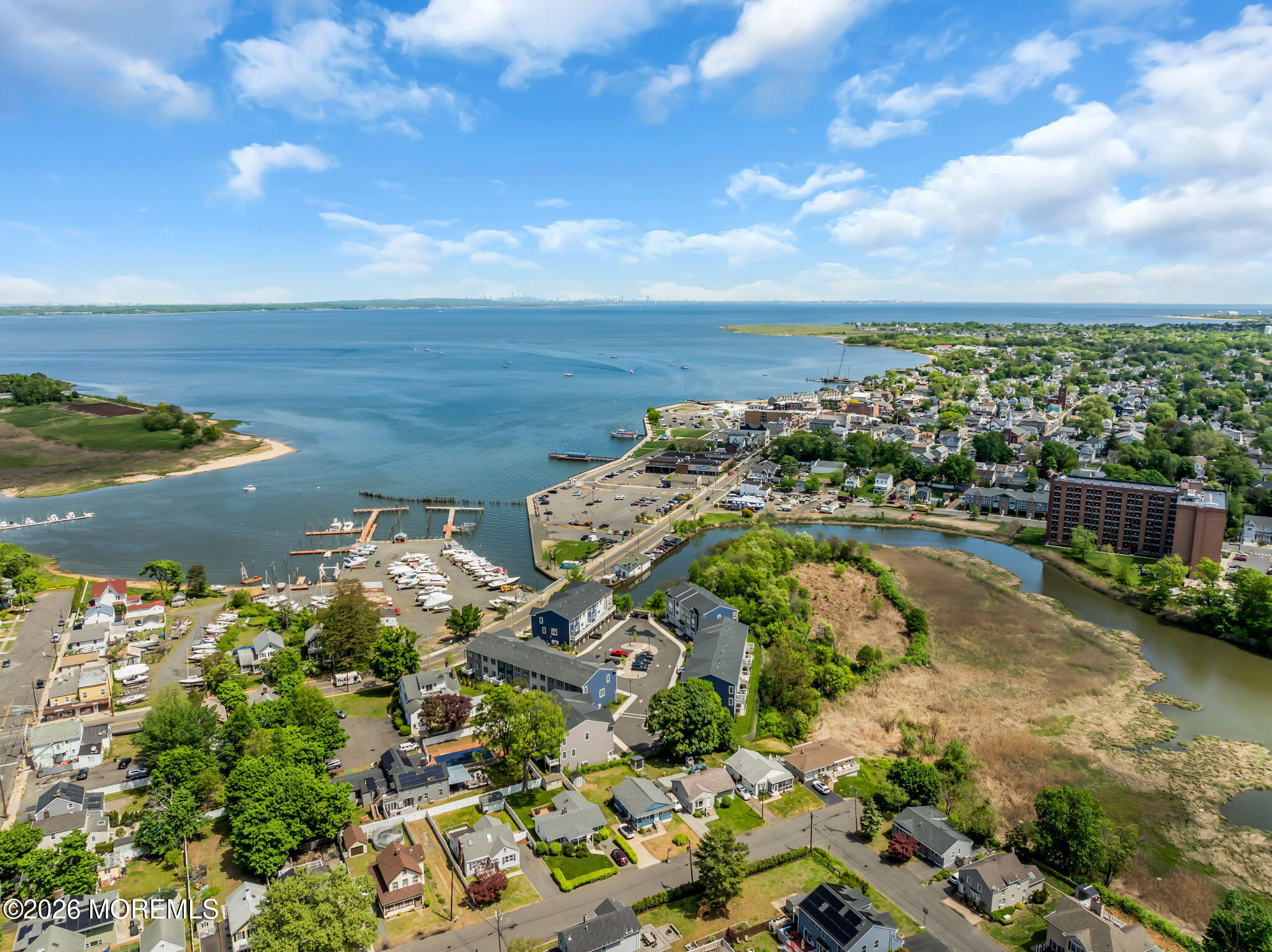 12 Raritan Boulevard Keyport, NJ 07735 - Photo 38 of 41 a view of a lake with a houses