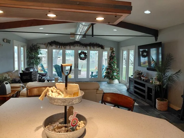 a room with furniture and a wooden floor