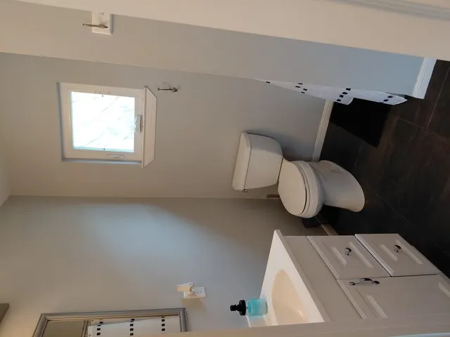 a living room with a furniture