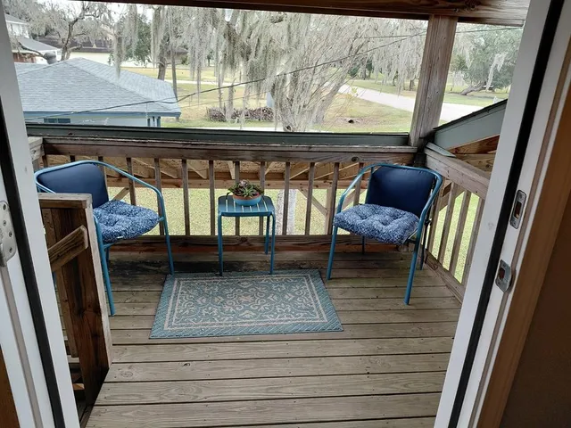 a bedroom with a bed and tv