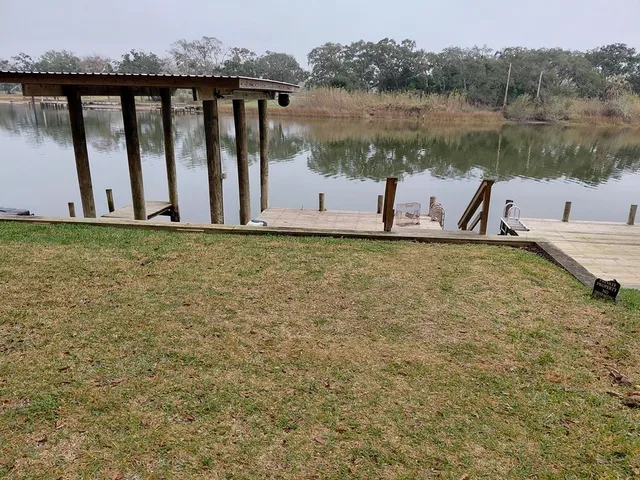 a view of a lake with a mountain in the background