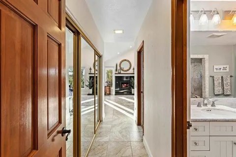 a bathroom with shower and a bathtub