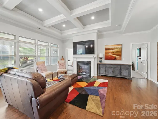 a living room with furniture or fireplace and a flat screen tv