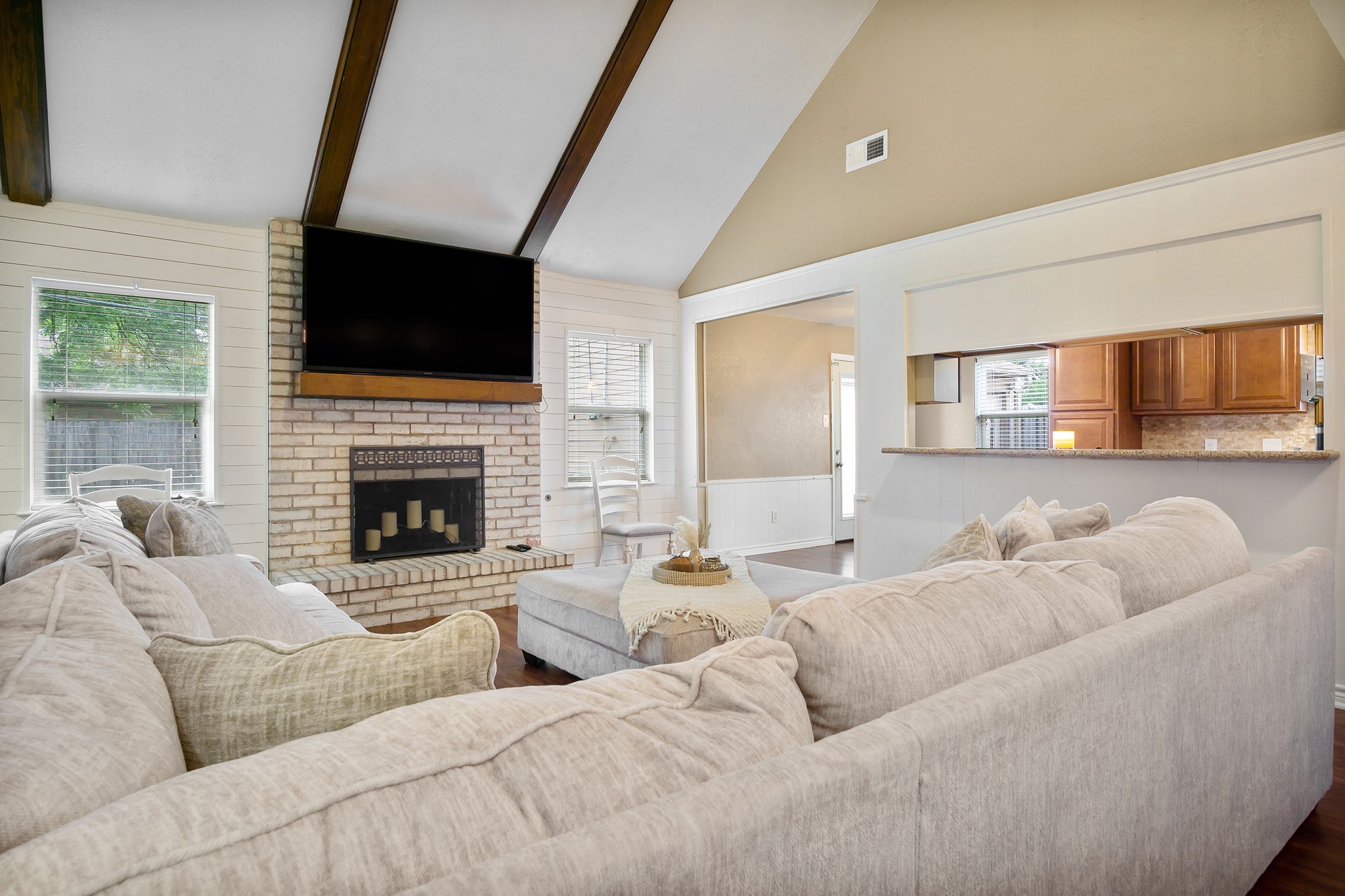 706 Yale Lane Deer Park, TX 77536 - Photo 19 of 43 a living room with furniture fireplace and flat screen tv