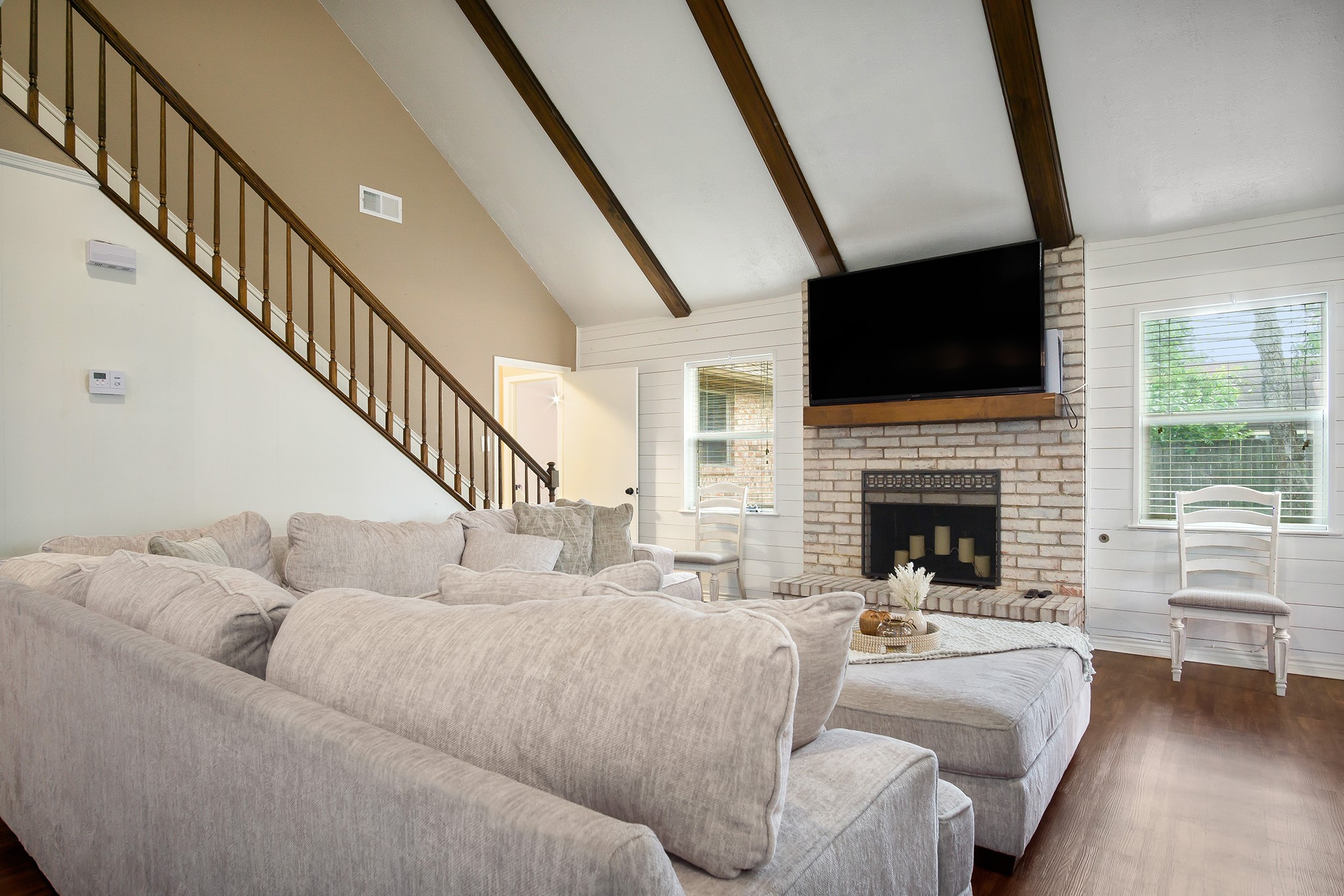 706 Yale Lane Deer Park, TX 77536 - Photo 20 of 43 a living room with furniture fireplace and a flat screen tv