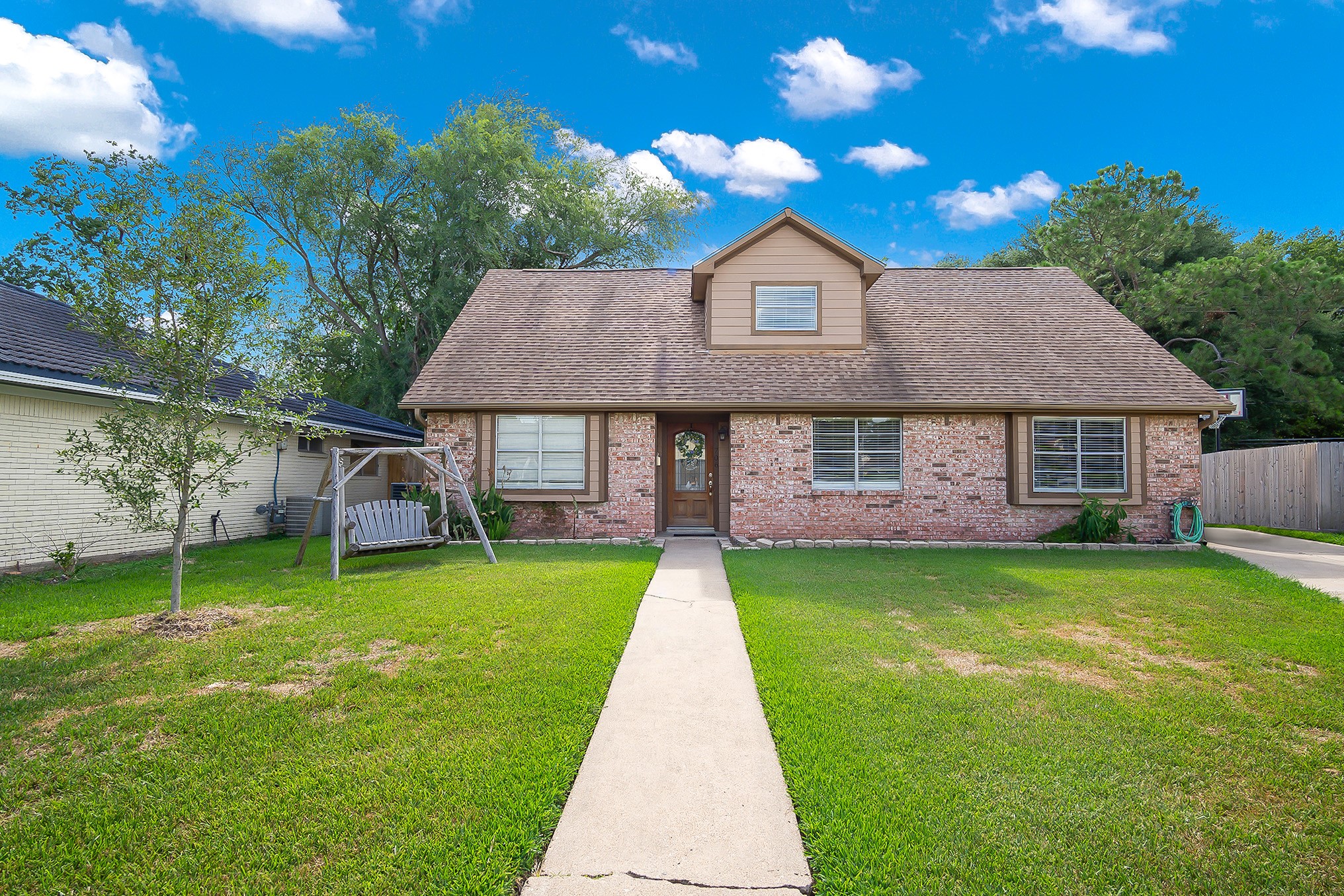 706 Yale Lane Deer Park, TX 77536 - Photo 2 of 43 a front view of a house with a yard