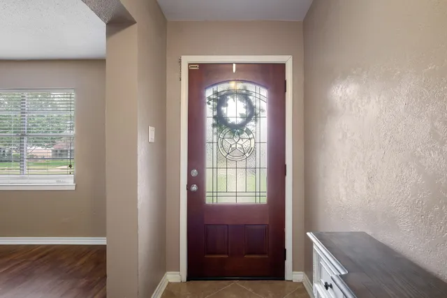 a kitchen with stainless steel appliances granite countertop a sink stove and microwave