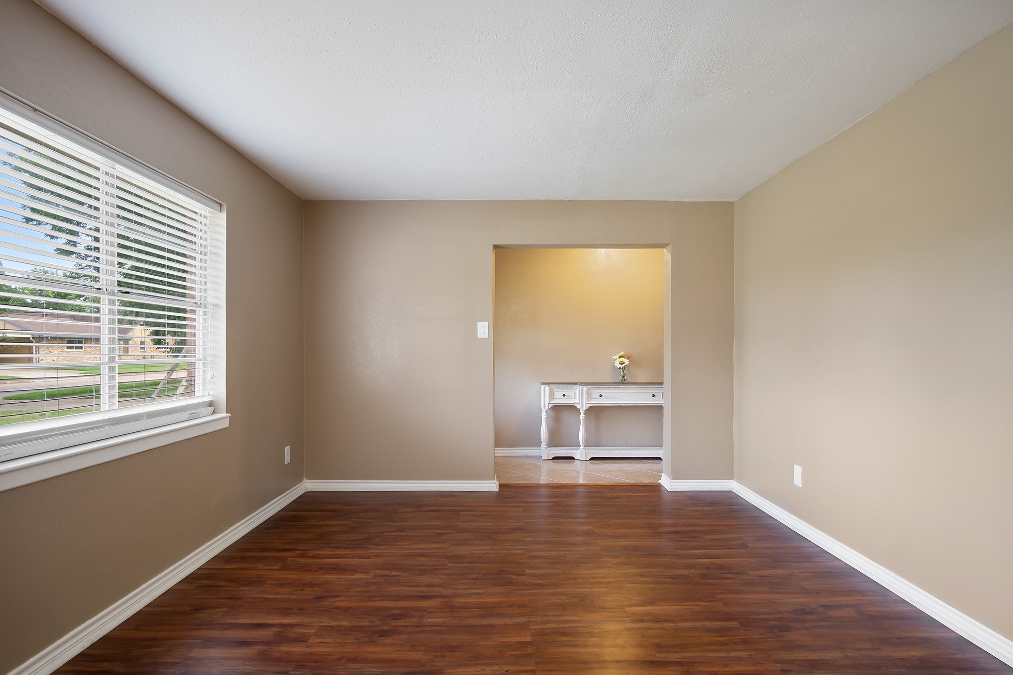 706 Yale Lane Deer Park, TX 77536 - Photo 8 of 43 a view of empty room with wooden floor and fan