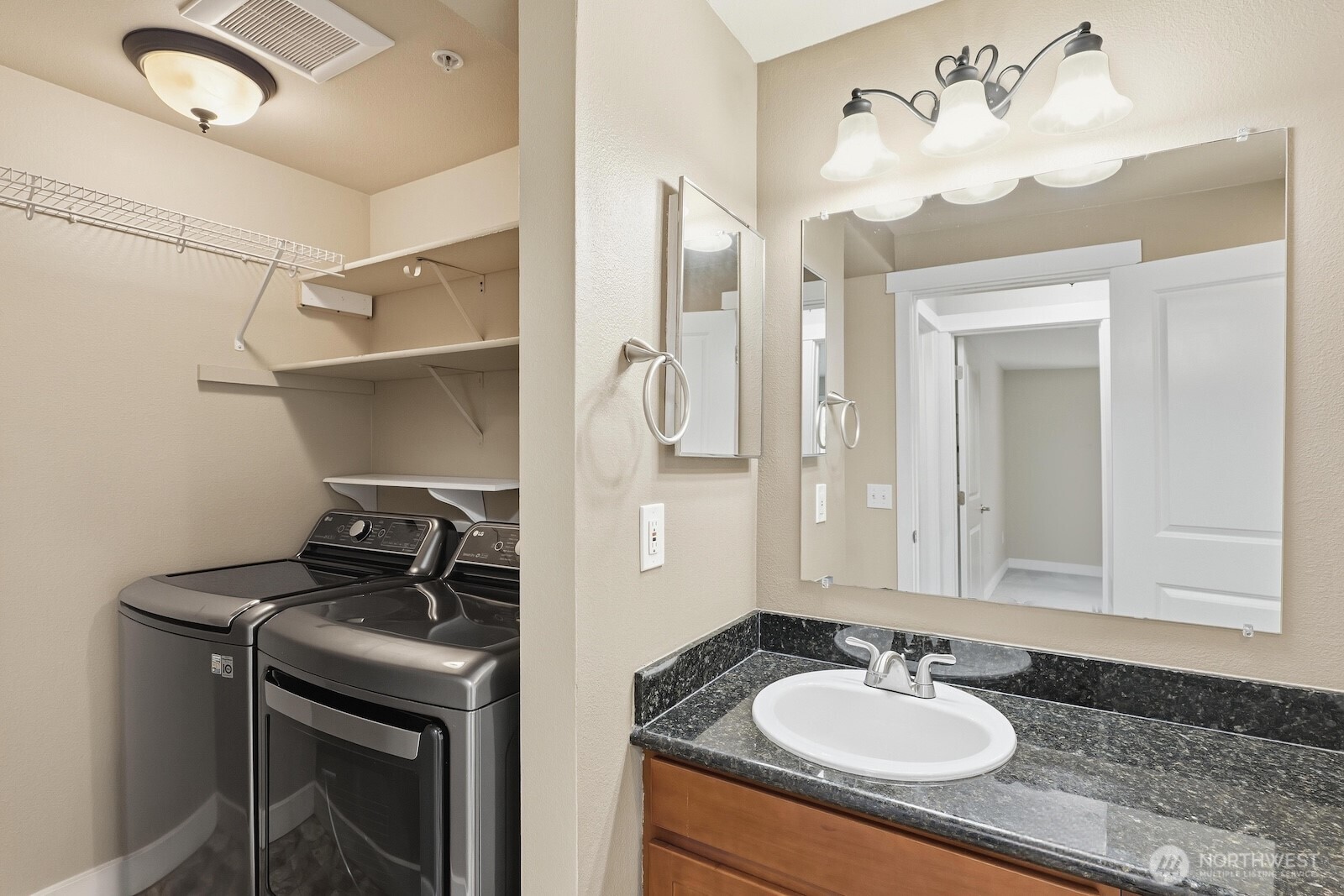 16409 Currie Road Southeast, Unit A308 Monroe, WA 98272 - Photo 12 of 21 a bathroom with a sink double vanity