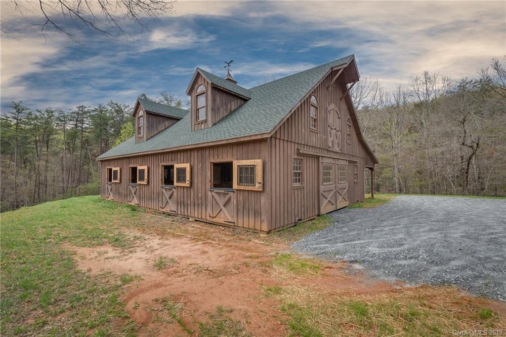 0 Sloping Meadow Mill Spring, NC 28756 - Photo 13 of 26 a view of a house with a yard