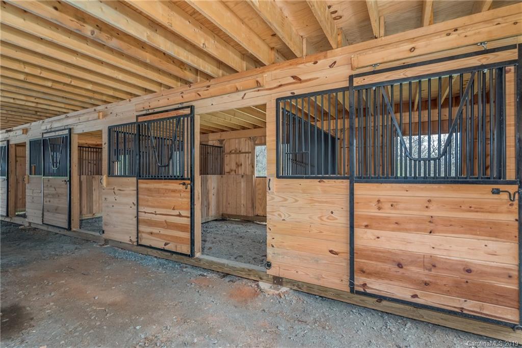 0 Sloping Meadow Mill Spring, NC 28756 - Photo 15 of 26 a view of a entrance door of the house