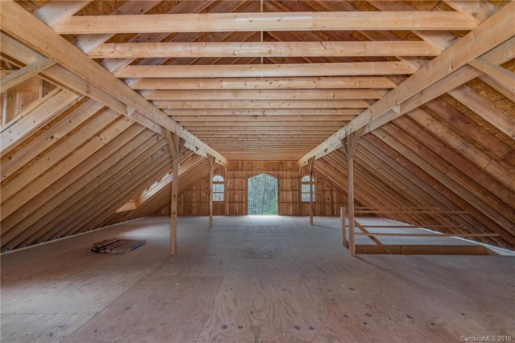 0 Sloping Meadow Mill Spring, NC 28756 - Photo 22 of 26 a view of an empty room with stairs