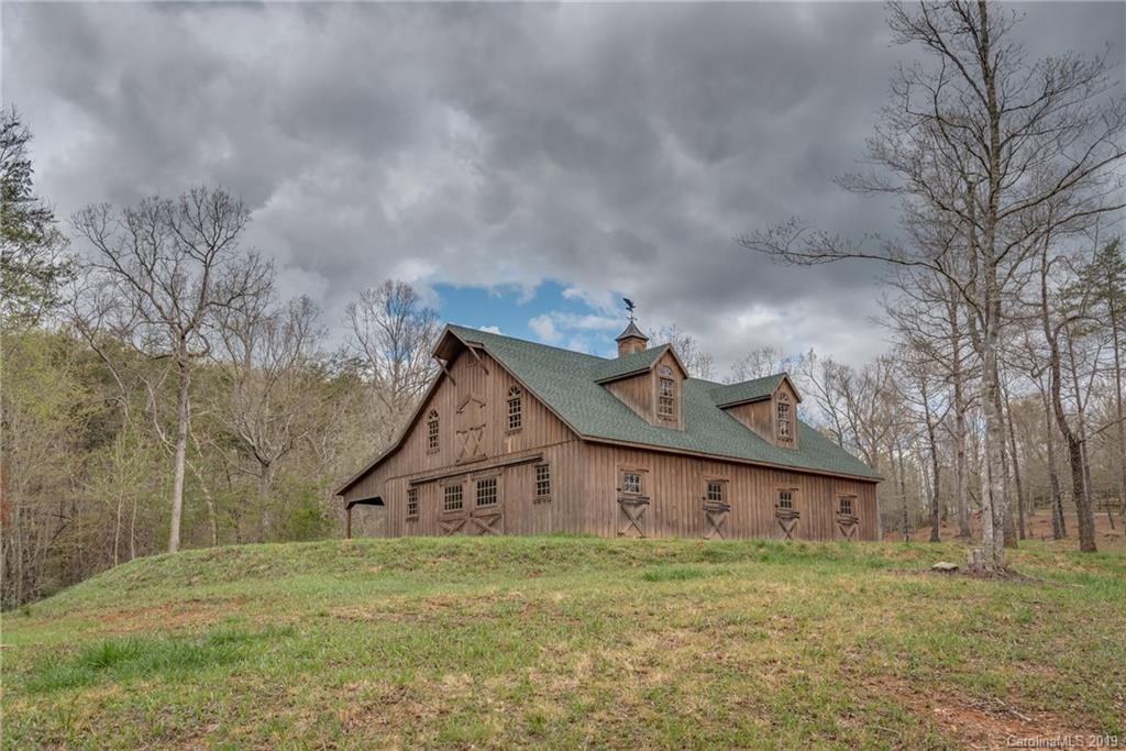 0 Sloping Meadow Mill Spring, NC 28756 - Photo 6 of 26 a view of a house with a yard