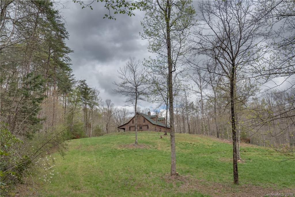 0 Sloping Meadow Mill Spring, NC 28756 - Photo 10 of 26 a view of a back yard of the house