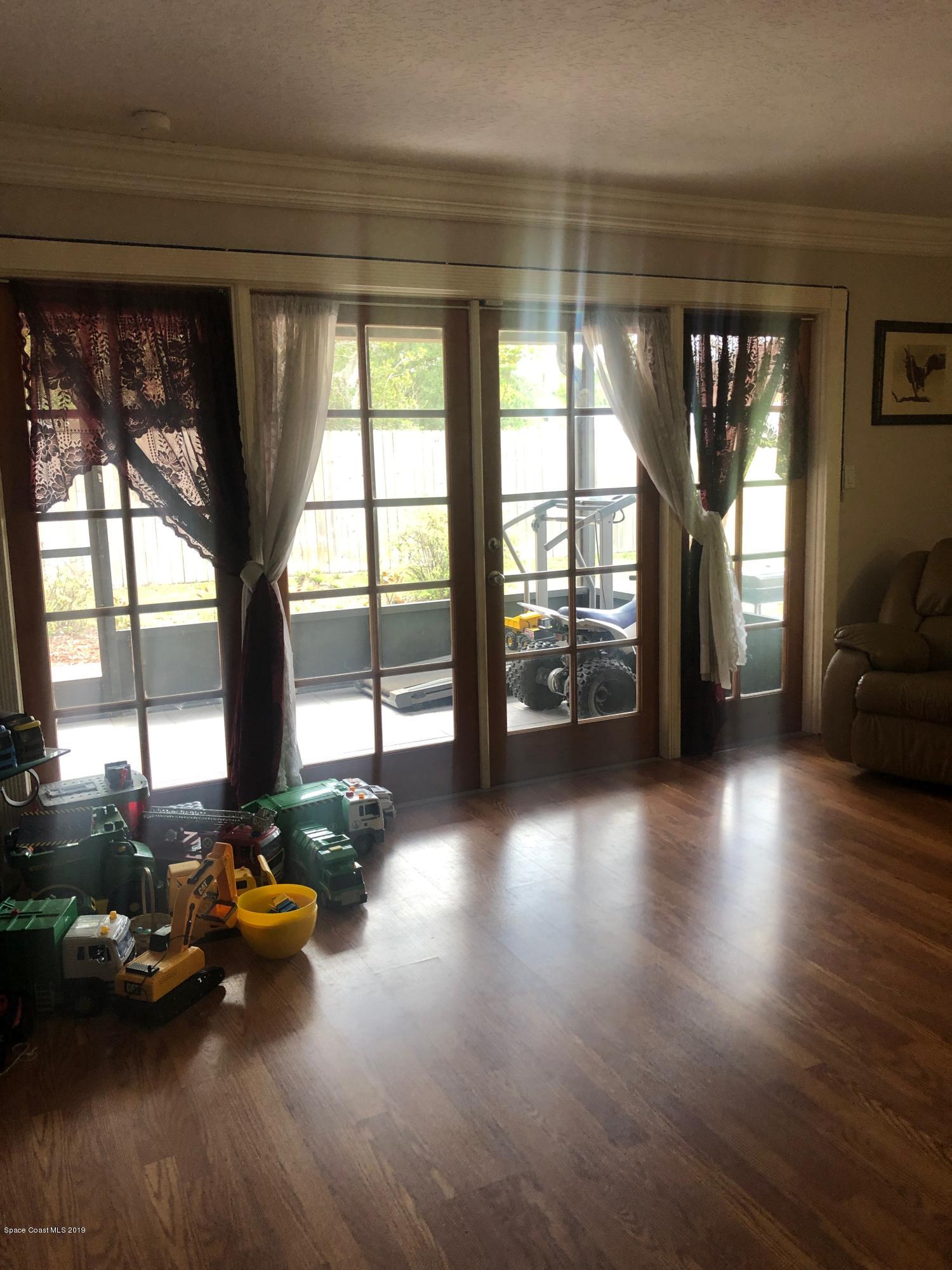 4869 Sisson Road Titusville, FL 32780 - Photo 12 of 23 Livingroom