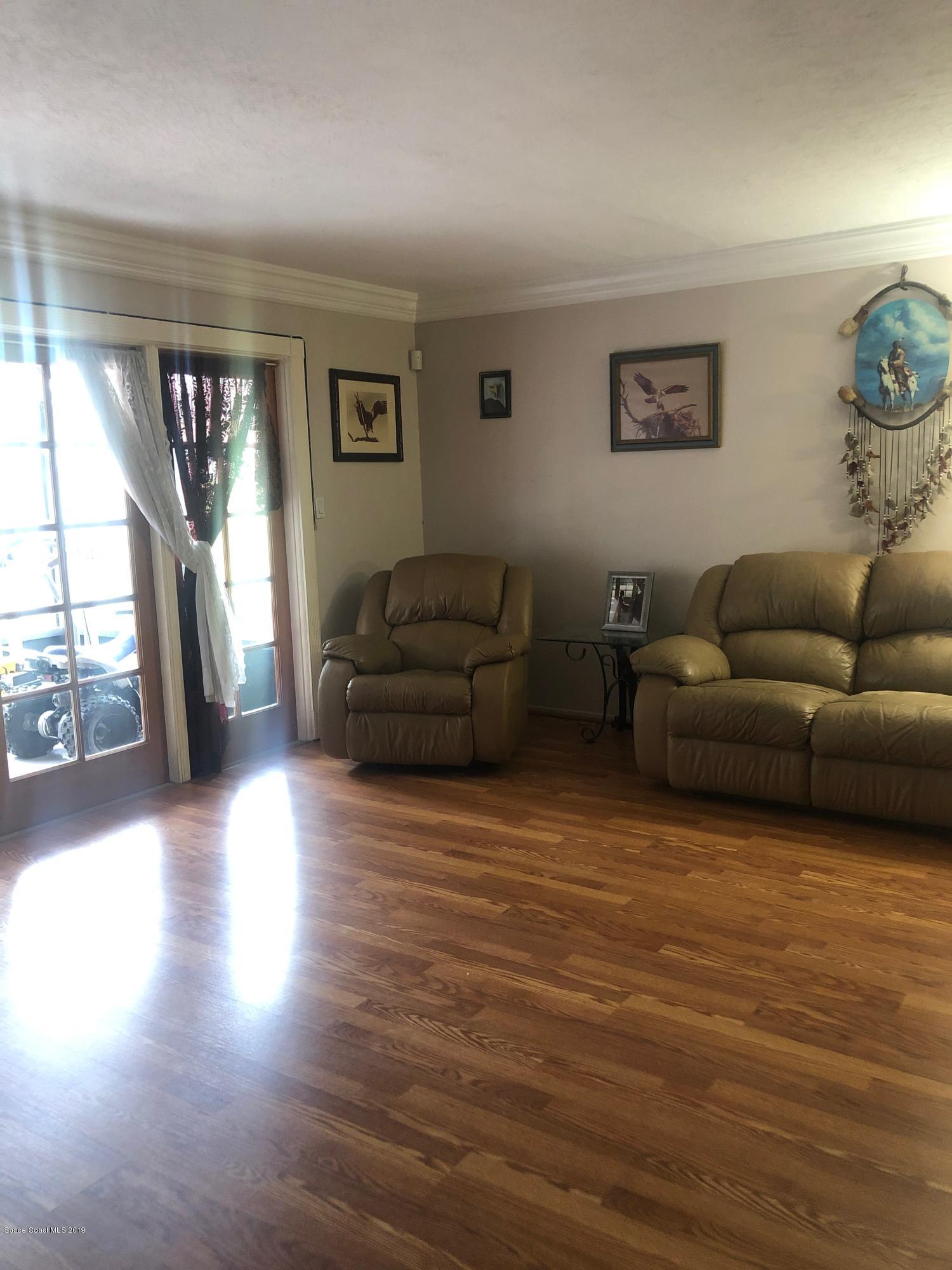 4869 Sisson Road Titusville, FL 32780 - Photo 13 of 23 Livingroom 2